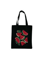  Black tote bag with vibrant watermelon slice design.